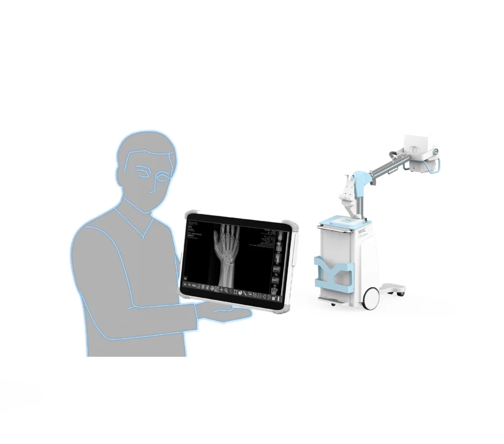 Technik z tabletem i obrazem RTG dłoni przy aparacie GMM MAC Revolution