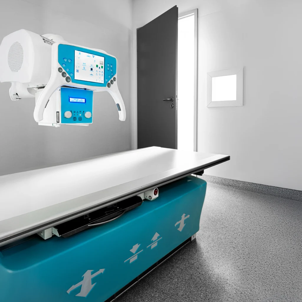 Stół pacjenta i lampa RTG w pracowni Salve Medica w Łodzi